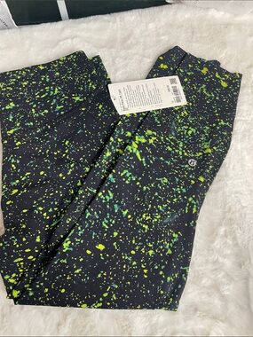 lululemon athletica Black Leggings with Neon Yellow-Green Splatter